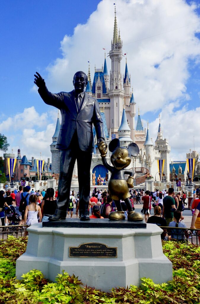 walt and mickey statue at the magic kingdom