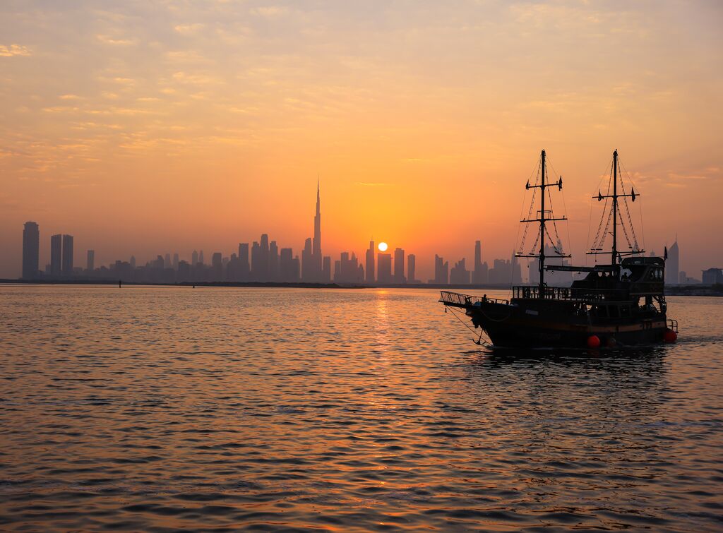 Traditional dhow boats on Dubai Creek in the United Arab Emirates