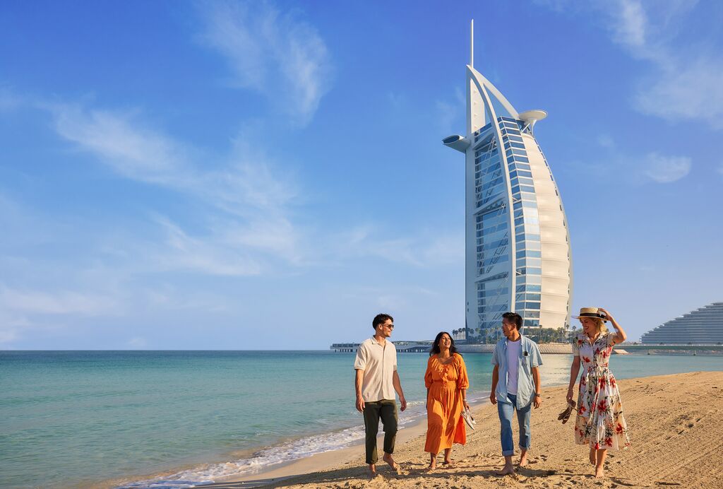 Group enjoys at JBR Beach by the sea in Dubai, United Arab Emirates