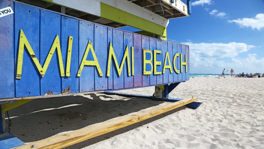 Iconic Miami Beach sign at beach entrance in Miami, Florida