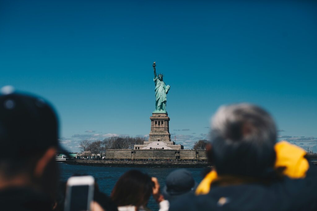 Statue of Liberty New York from the ferry on the way to Liberty Island during city break New York