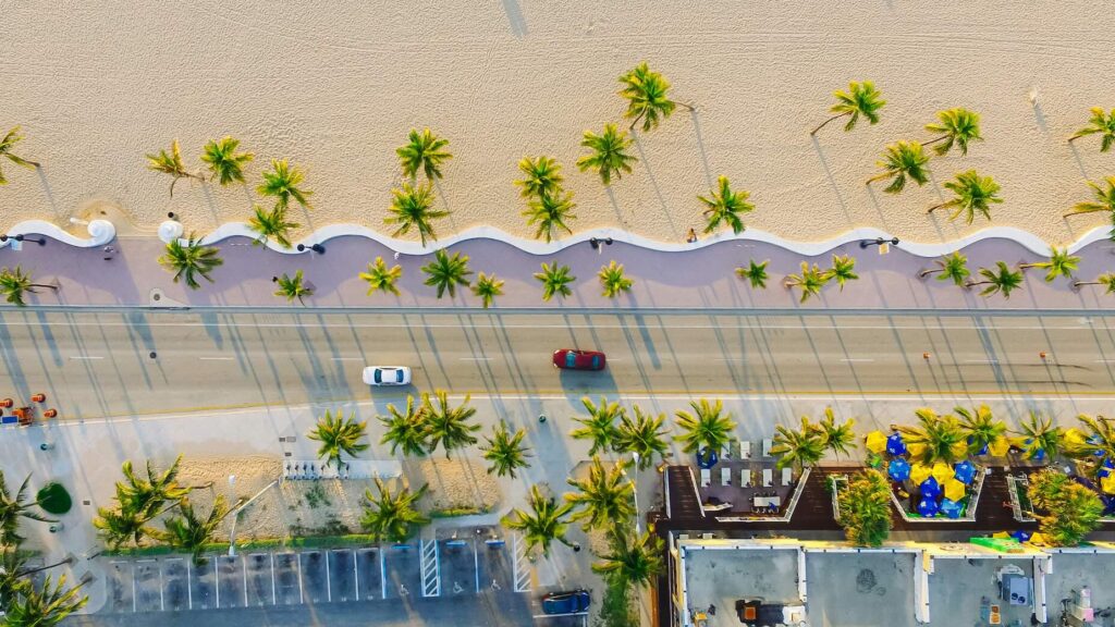 Aerial view of Miami Beach with beach, promenade and city from above