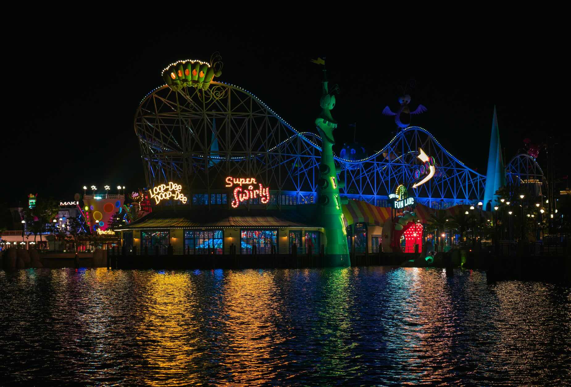 Universal Beijing Studios pier and attractions atmospherically lit at night