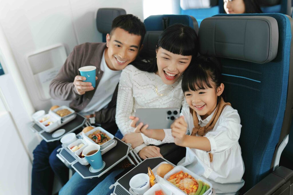 Familie aan boord van Cathay Pacific