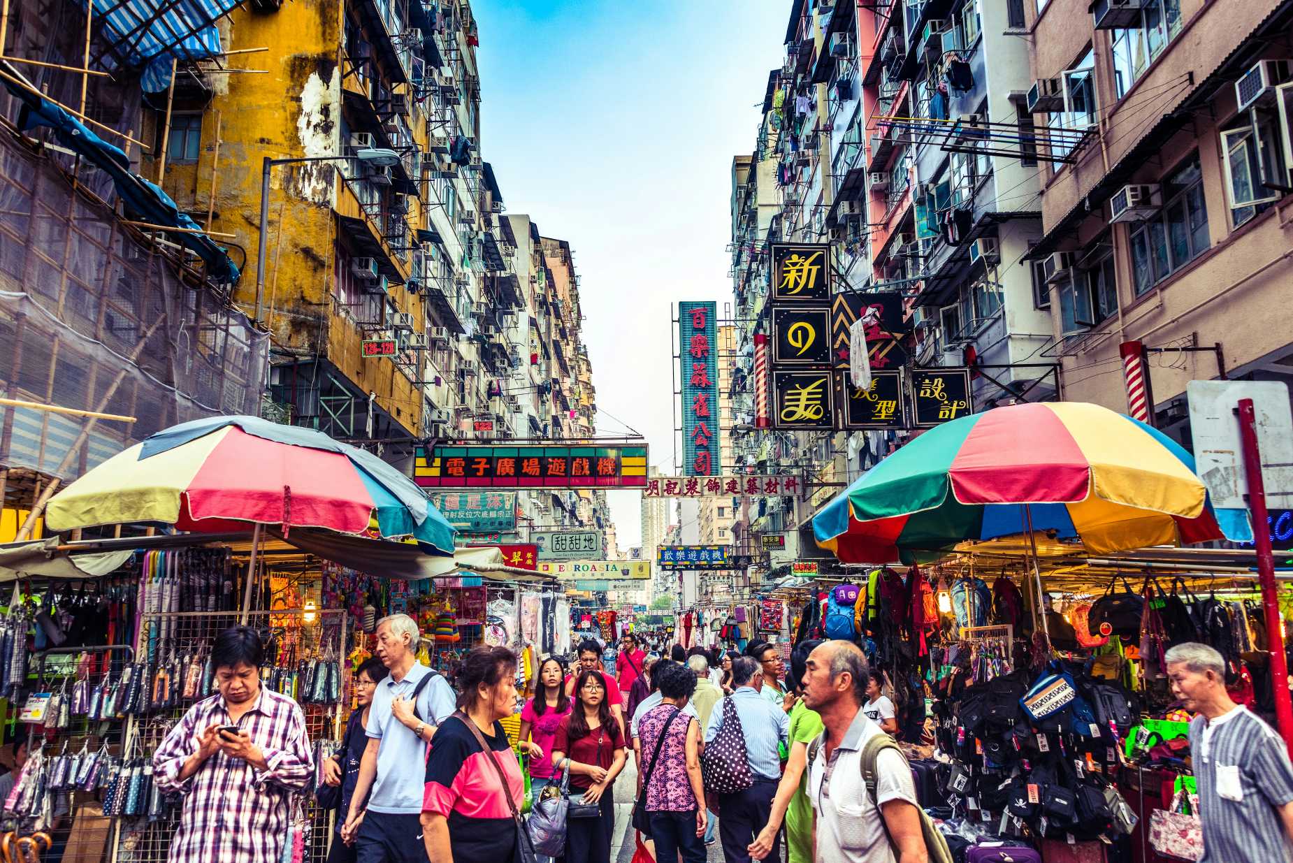 The busy and narrow streets of Kowloon during a tour of Asia
